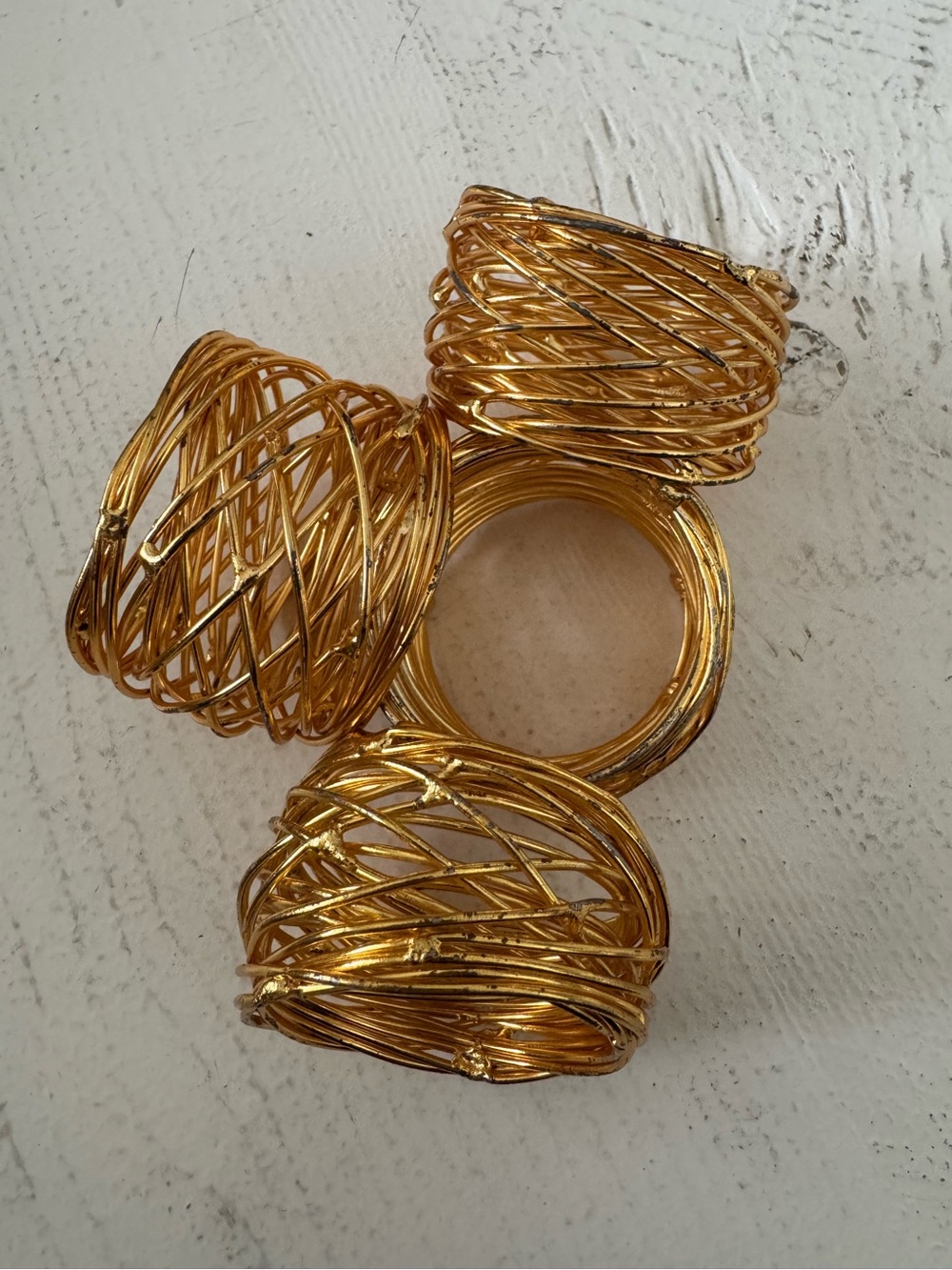 Gold nest like napkin rings - set of 4